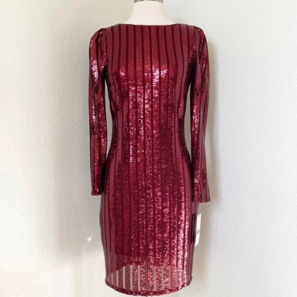 Long sleeve sequin dress, low back.  NWT